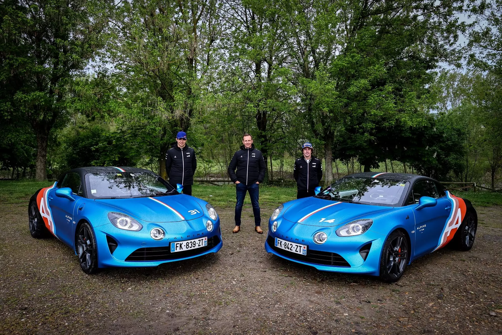 Esteban Ocon, Laurent Rossi e Fernando Alonso,